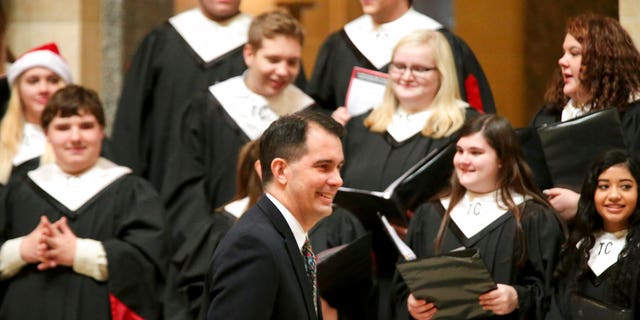   Wisconsin Governor, Governor of Wisconsin, Arrives to Light Capitol Rotunda Christmas Tree, Tuesday, December 4 In 2018 at the Capitol in Madison, Wisconsin, the Senate and the Assembly are about to send dozens of amendments to the legislation in effect at Walker's office on Tuesday. (Steve Apps / Wisconsin State Journal via AP) 