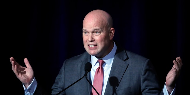 Acting Attorney General Matthew G. Whitaker speaks during the Project Safe Neighborhoods National Conference in Kansas City, Mo., Thursday, Dec. 6, 2018. (AP Photo/Orlin Wagner)