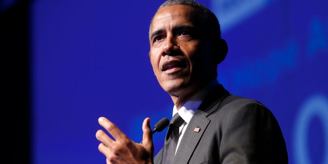 Obama-aligned Organizing for Action will be merged with another group to fight gerrymandering. (Associated Press)