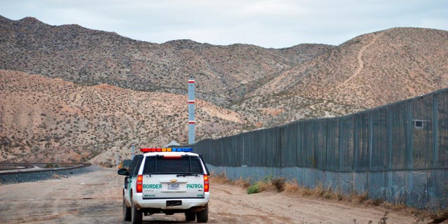 A U.S. Border Patrol agent patrols Sunland Park along the U.S.-Mexico border next to Ciudad Juarez. . (AP Photo/Russell Contreras, File)