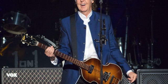 FILE - In this Monday, July 10, 2017 file photo, Sir Paul McCartney performs at Amalie Arena in Tampa, Fla. Most hosts would be quite happy to have Paul McCartney come to a shindig. Paul McCartney’s Christmas message to his fans around the world: Don’t be like me and eat and drink too much. The 76-year-old former Beatle tweeted his lighthearted holiday wishes Tuesday, Dec. 25, 2018 illustrated with photos from his younger days.