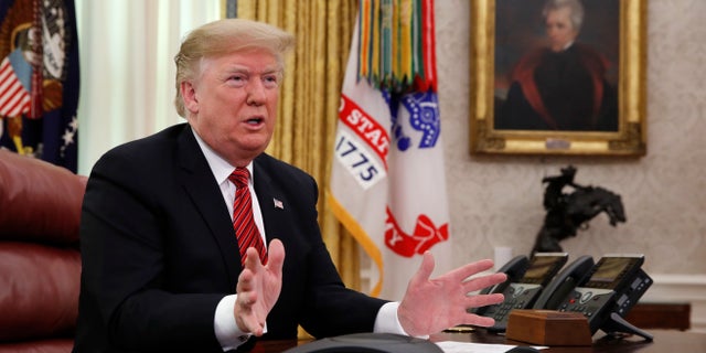 President Trump greets members of the five branches of the military by video conference on Christmas Day. (AP)