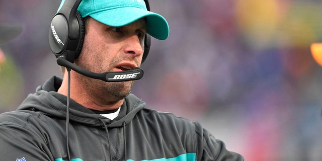 Miami Dolphins head coach Adam Gase watches the first half of an NFL football game against the Buffalo Bills, Sunday, Dec. 30, 2018, in Orchard Park, N.Y.