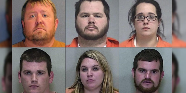 The nine suspects, six of which are seen here, were charged in connection with the bear maulings.