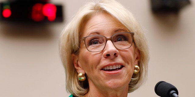 U.S. Education Secretary Betsy DeVos envisions school choice nationwide where students can use public funds to attend private schools. (File photo: May 22, 2018. REUTERS/Leah Millis)