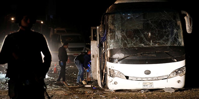 A roadside bomb hit a tourist bus on Friday in an area near the Giza Pyramids, killing two Vietnamese tourists and wounding 12 others, Egypt's Interior Ministry said in a statement.