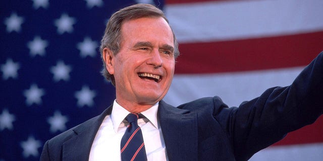 George Bush waves to a crowd of supporters Nov. 5, 1988. Bush and his running mate Dan Quayle defeat Michael Dukakis in the Presidential election. His efforts to reduce the deficit failed while creating the lowest growth period since the Great Depression. (Photo by Cynthia Johnson/Liaison)