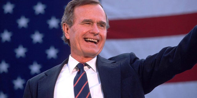 George Bush waves to a crowd of supporters Nov. 5, 1988. Bush and his running mate Dan Quayle defeat Michael Dukakis in the Presidential election. His efforts to reduce the deficit failed while creating the lowest growth period since the Great Depression. (Photo by Cynthia Johnson/Liaison)