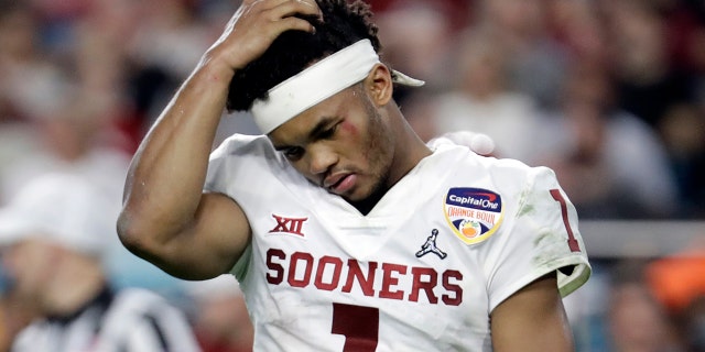 Oklahoma quarterback Kyler Murray (1) walks off the field after his helmet came off on a play, during the second half of the Orange Bowl NCAA college football game against Alabama, Saturday, Dec. 29, 2018, in Miami Gardens, Fla.