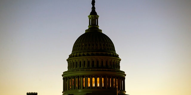 The U.S. Capitol dome is seen before the sun rises in Washington, Tuesday, Dec. 18, 2018. (Associated Press)