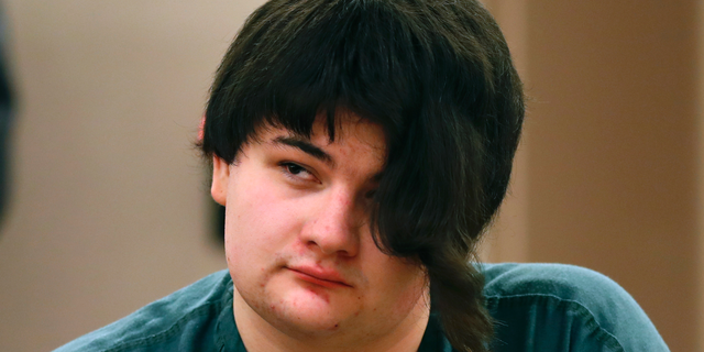 Andrew Balcer listens to testimony during the sentencing hearing for killing his parents, Dec. 4, 2018, at the Capital Judicial Center in Augusta, Maine.