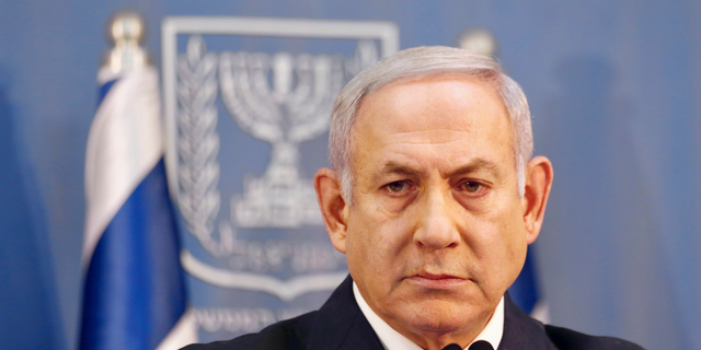 FILE - In this Nov. 18, 2018 file photo, Israeli Prime Minister Benjamin Netanyahu delivers a statement in Tel Aviv. (AP Photo/Ariel Schalit, File)