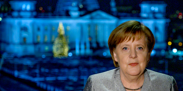 German Chancellor Angela Merkel poses for a photograph after the recording of her annual New Year's speech at the Chancellery in Berlin, Germany, Dec. 30, 2018. (John MacDougall/pool photo via AP)