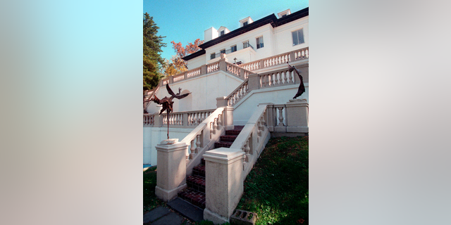 FILE - This Oct. 19, 1998 file photo shows the Villa Lewaro, century-old Italianate-style mansion that was the home of Madam C.J. Walker, a black entrepreneur considered to be the nation's first self-made female millionaire, in Irvington, N.Y. The National Trust for Historic Preservation announced Wednesday Dec. 19, 2018, that Villa Lewaro was recently bought by Richelieu Dennis and his family. The price wasn't released. (AP Photo/Ed Bailey, File)