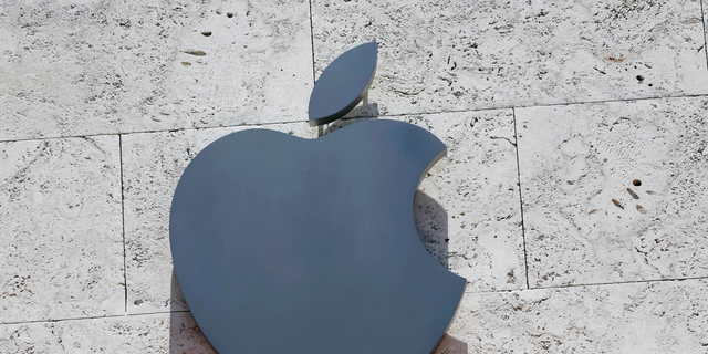FILE - In this Aug. 8, 2017, file photo, the Apple logo is shown at a store in Miami Beach, Fla.  (AP Photo/Alan Diaz, File)