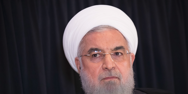 FILE - In this Sept. 26, 2018, file photo, Iranian President Hassan Rouhani speaks during a news conference in New York. President Rouhani is warning Western countries that they will face a massive influx of drugs if Iran becomes weakened by U.S. sanctions. Rouhani spoke in Tehran on Saturday, Dec. 8, 2018, at a six-nation conference on fighting terrorism attended by parliament speakers of Afghanistan, Iran, Pakistan, Turkey, China and Russia. (AP Photo/Mary Altaffer, File)