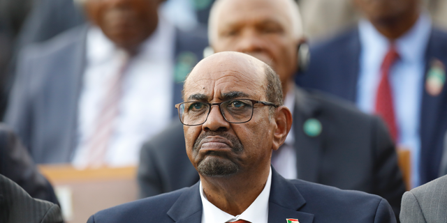 FILE - In this July 9, 2018 file photo, Sudan's President Omar Bashir attends a ceremony for Turkey's President Recep Tayyip Erdogan, at the Presidential Palace in Ankara, Turkey. An umbrella of independent professional unions on Sunday, Dec. 30, 2018 is calling on people to march on the presidential palace in Sudan’s capital, Khartoum, to demand that autocratic President Omar Bashir step down. (AP Photo/Burhan Ozbilici, File)