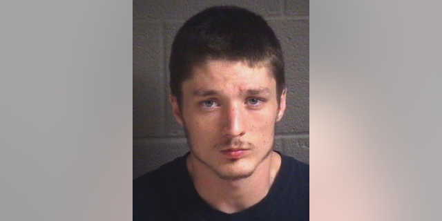 FILE - This undated photo provided by the Buncombe City-County Bureau of Identification shows Derek Shawn Pendergraft. A new indictment alleges sexual assault was the motive for the killing of Sara Ellis , a cook at the scenic North Carolina mountain inn last summer. Federal prosecutors announced Thursday, Dec. 6, 2018, they filed a superseding indictment adding two counts of aggravated sexual abuse resulting in death against Derek Shawn Pendergraft. (Buncombe City-County Bureau of Identification via AP)