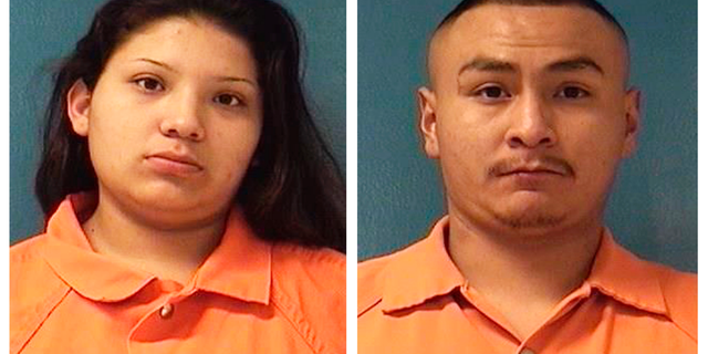 This combination of Saturday, Dec. 8, 2018 booking photos providing by McKinley County Adult Detention Center shows Shayanne Nelson, left, and Tyrell Bitsilly, right. Nelson's 8-month-old girl is fighting for her life after police say her 3-year-old brother accidentally shot her in the face Saturday in a Gallup, N.M., motel room while Nelson and her boyfriend Bitsilly were in a shower. Nelson and Bitsilly face child abuse charges. (McKinley County Adult Detention Center via AP)