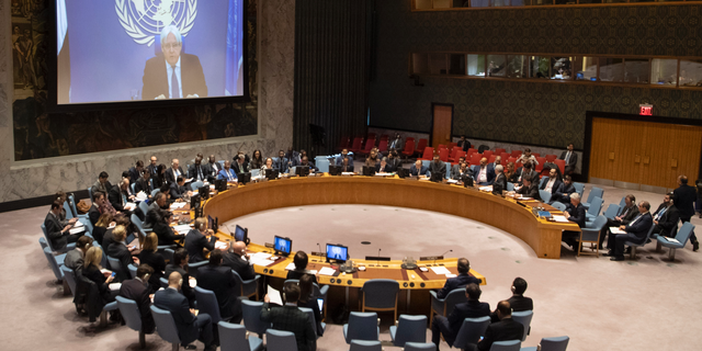 Martin Griffiths, top, the United Nations envoy for Yemen, gives a video briefing to the Security Council at U.N. headquarters Friday, Dec. 14, 2018. Griffiths told the council that a speedy presence in the field is "an essential part of the confidence" needed to accompany implementation of Thursday's agreement between Yemen's government and Houthi Shiite rebels. (Eskinder Debebe/United Nations via AP)