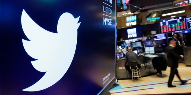 FILE - In this Feb. 8, 2018, file photo, the logo for Twitter is displayed above a trading post on the floor of the New York Stock Exchange (AP Photo/Richard Drew, File)