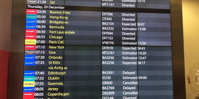 The arrivals board at Gatwick Airport showing cancelled, diverted and delayed flights as the airport remains closed with incoming flights delayed or diverted to other airports, after drones were spotted over the airfield last night and this morning Thursday Dec. 20, 2018. London's Gatwick Airport remained shut during the busy holiday period Thursday while police and airport officials investigate reports that drones were flying in the area of the airfield. (Thomas Hornall/PA via AP)