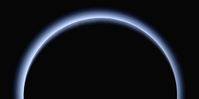 This image made available by NASA in March 2017 shows Pluto lit by the sun as the New Horizons spacecraft farther away at a distance of about 200,000 kilometers. The probe will ring in 2019, exploring an even more distant and mysterious world. (NASA / Johns Hopkins University Applied Physics Laboratory / Southwest Research Institute via AP)