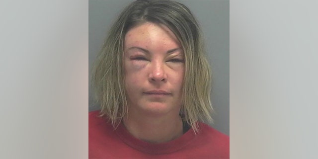 Jessica Blick, 37, was arrested after striking an officer with a concrete block, police say.