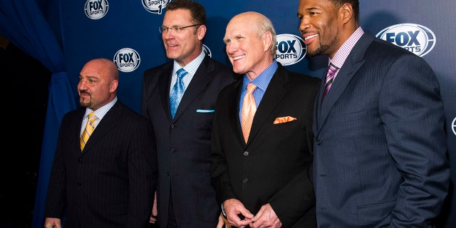 From left, Jay Glazer, Howie Long, Terry Bradshaw and Michael Strahan attend the Fox Sports Media Upfront party celebrating the new Fox Sports 1 network in New York, March 5, 2013. (Associated Press)