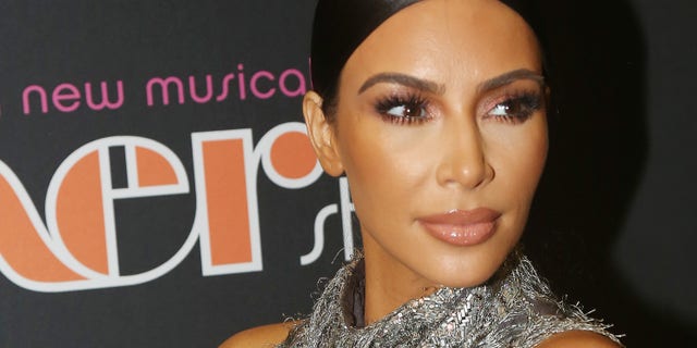 Kim Kardashian was criticized for allowing her 5-year-old daughter to wear a bold red lipstick in their Christmas photos.