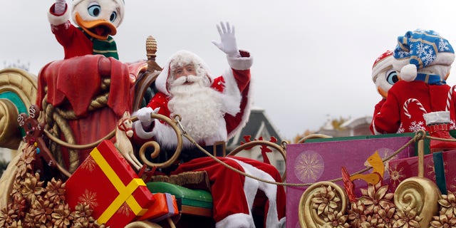 Santa Clause was launched from his sleigh (not pictured) during a parade down Main Street U.S.A. at California's Disneyland park.