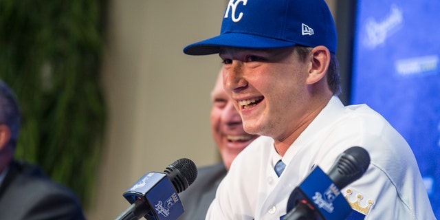 The 2018 Kansas City Royals first-round pick pitcher Brady Singer smiles during a press conference before the game between the Cleveland Indians and the Kansas City Royals at Kauffman Stadium on July 3, 2018 in Kansas City, Missouri. (Photo by Brian Davidson/Getty Images)