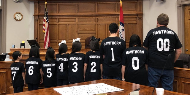 The Hawthorns wore their new t-shirts showing the seven siblings they added to their family early in December.