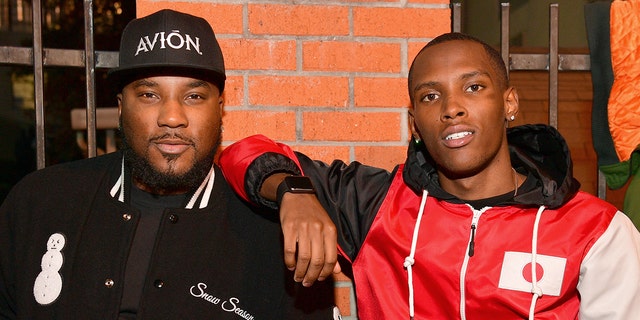 Jadarius Jenkins, right, son of rapper Jeezy, left, reportedly suffered a knife wound to the face during an altercation in Georgia.