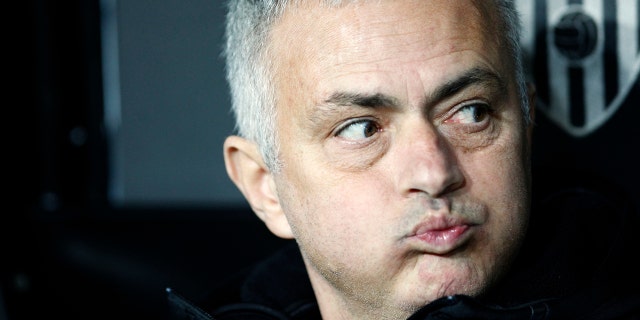 Dec.12: Manchester United coach Jose Mourinho looks out from the bench prior a Group H Champions League soccer match between Valencia and Manchester United at the Mestalla Stadium in Valencia, Spain. (AP Photo/Alberto Saiz)