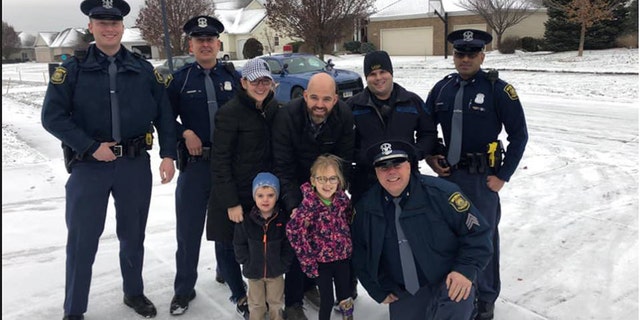 Michigan State Police escort home girl with life-threatening disease ...