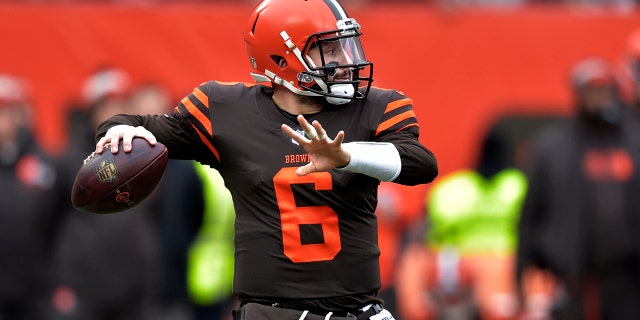 Cleveland Browns quarterback Baker Mayfield throws during the first half of an NFL football game against the Cincinnati Bengals, Sunday, Dec. 23, 2018, in Cleveland.