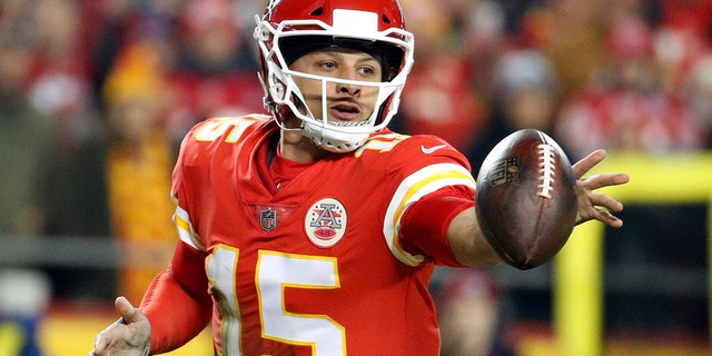 FILE - In this Dec. 13, 2018 file photo Kansas City Chiefs quarterback Patrick Mahomes (15) flips the ball during the first half of an NFL football game against the Los Angeles Chargers in Kansas City, Mo. (AP Photo/Charlie Riedel, file)