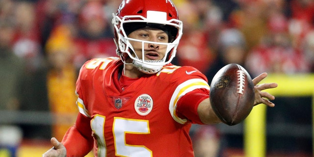 FILE - In this Dec. 13, 2018 file photo Kansas City Chiefs quarterback Patrick Mahomes (15) flips the ball during the first half of an NFL football game against the Los Angeles Chargers in Kansas City, Mo. (AP Photo/Charlie Riedel, file)