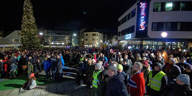 People from Maren Ueland's hometown gather to honor Maren Ueland from Norway and Louisa Vesterager Jespersen from Denmark, who were killed in Morocco, in Bryne, Norway, Friday. Jan Kare Ness/NTB Scanpix/via REUTERS