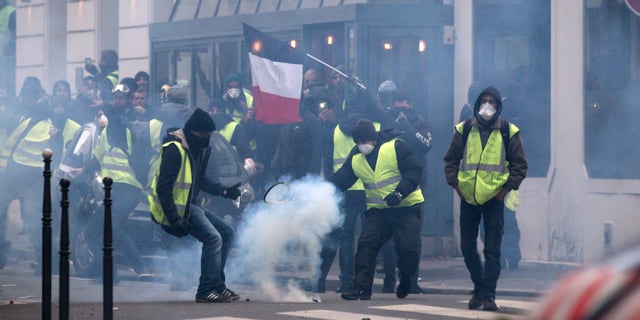 Aurelien Morissard / Fox News; Clashes between police and demonstrators, during a demonstration of the "Yellow vests", in Paris, France, on December 8th 2018.