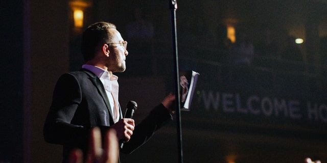 Carl Lentz, Hillsong Church NYC lead pastor, gave a special message to Darnell's father at the close of the service.