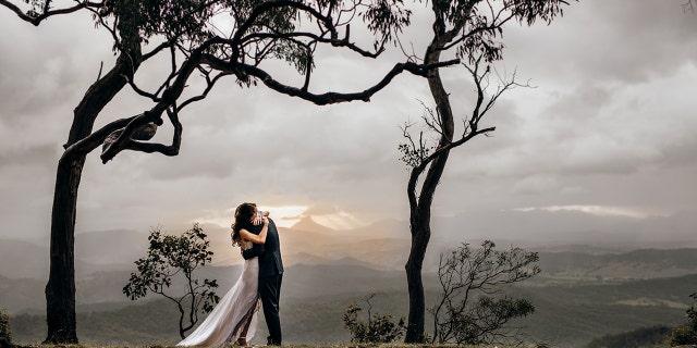 The day of the wedding, Laniakea read the letter to her new husband on the top of a mountain.