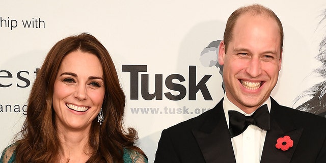 British Prince William Duke of Cambridge (R) and British Catherine Duchess of Cambridge (L) attend the Tusk Conservation Awards at the Banqueting House in London on November 8, 2018. - The Tusk Conservation Awards recognize wildlife protection work achievements and the natural heritage of Africa.