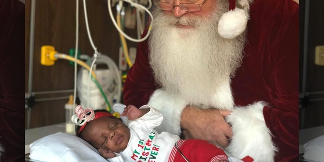 Santa snapped photos with some of the NICU babies.