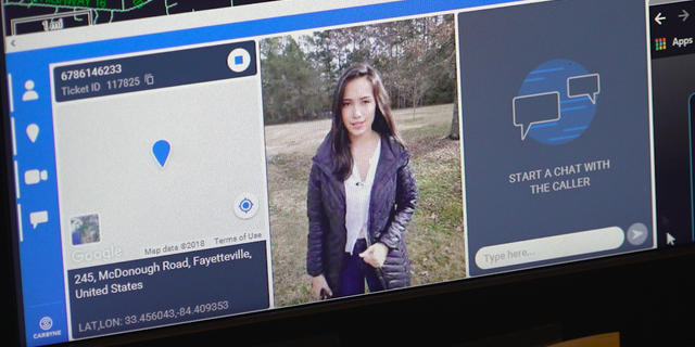 Fox's Emilie Ikeda tests out Fayette County's video 911 call, appearing on a call-taker's screen.