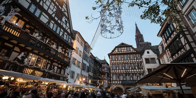 More than 1,000 people, according to reports, filled a square in the French city of Strasbourg on Sunday to show respect and sympathy for the victims of last week's shooting attack near a famous Christmas market as the death toll rose to five. (AP Photo/Jean-Francois Badias)