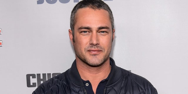 Taylor Kinney helped a man whose car's tire blew out on Christmas Eve.