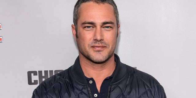 Taylor Kinney helped a man whose car's tire blew out on Christmas Eve.