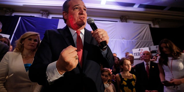 Republican U.S. Senator Ted Cruz pumps his fist at his midterm election night party as his wife Heidi (L) looks on in Houston, Texas, U.S. November 6, 2018. Reuters/Cathal Mcnaughton